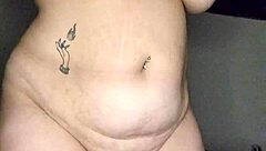 Luna caught undressing plays with huge natural tits solo