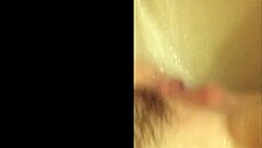 serbian babe fingers horny clit in steamy shower bath