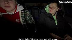 Curvy brunette warms up outdoors car ride