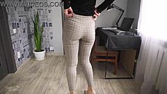 office worker teases with ass flash in tight trousers