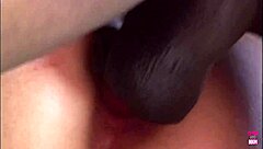 She takes a good whipping before swallowing two massive shafts in her throat