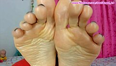 colombiana arches her flexible toes and relaxes in natural light