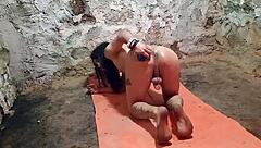 Ladyboy stretches tight ass with toy