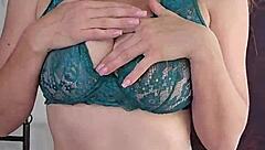 Hot milf performs a slow striptease dance