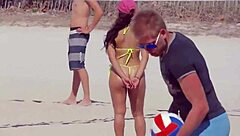 unbelievable awesome young girl with a micro bikini on the beach with her boyfriends relatives