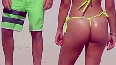 unbelievable awesome young girl with a micro bikini on the beach with her boyfriends relatives