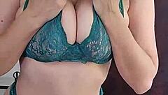 Hot milf performs a slow striptease dance