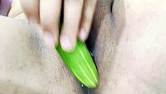 Girl records wet pussy cucumber play