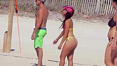 unbelievable awesome young girl with a micro bikini on the beach with her boyfriends relatives