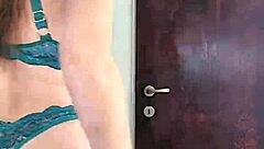Hot milf performs a slow striptease dance
