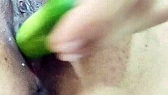 Girl records wet pussy cucumber play