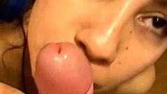 latina woman enjoys giving oral pleasure to partner