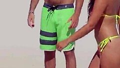 unbelievable awesome young girl with a micro bikini on the beach with her boyfriends relatives