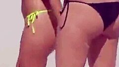 unbelievable awesome young girl with a micro bikini on the beach with her boyfriends relatives