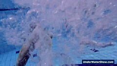 Horny girls strip eachother in the pool