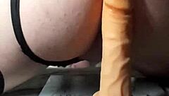 Branquinha gostosa rides toy by open window