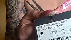 Woman tries on lingerie showing her curves and body