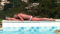 Blonde gets bum pummeled by pool