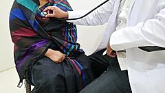 doctor examines patient boobs during medical checkup