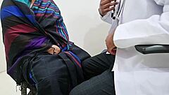 doctor examines patient boobs during medical checkup