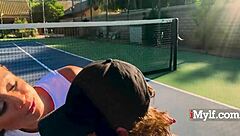 naked mature woman plays tennis outdoors