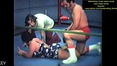 Mixed wrestling match unfolds with intense physical competition