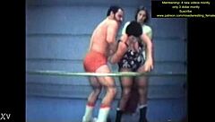 Mixed wrestling match unfolds with intense physical competition
