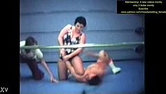 Mixed wrestling match unfolds with intense physical competition