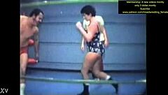 Mixed wrestling match unfolds with intense physical competition