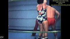 Mixed wrestling match unfolds with intense physical competition