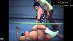 Mixed wrestling match unfolds with intense physical competition