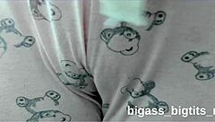 Curvy amateur in pajamas touches herself softly on camera