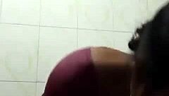 indian beauty bathing sensually in a sheer nighty