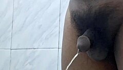 Pissing and taking a shower while masturbating
