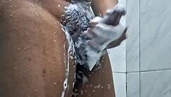 Pissing and taking a shower while masturbating