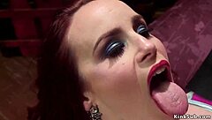 Blonde whips redhead ass in bondage