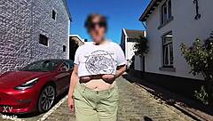 busty milf walks outside without bra