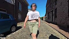 busty milf walks outside without bra