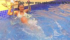 Rich woman masturbates in her swimming pool