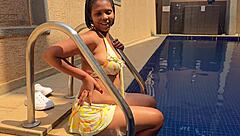 Rich woman masturbates in her swimming pool