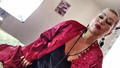Mature bitch in red negligee sucks cock