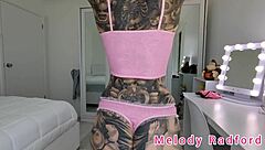 Pink gamer girl tries lingerie on