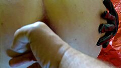 Warming up her tight ass with fingers first