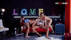 Double blowjob on the red couch both blondes gagging on two cocks