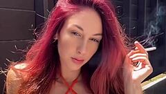 Italian milf enjoys a cigarette outside in the sun