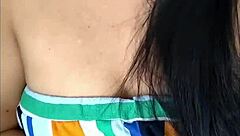 flirty busty woman touches her tits