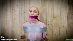 Darina blonde russian girl next door tied and gagged in bondage in glossy spandex catsuit ep