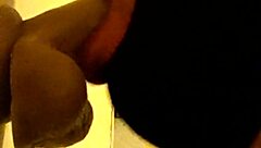 Bold gay guy in hood deepthroats dildo