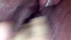 Amateur married woman enjoys and squirts abundantly.