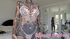 Amateur pornstar Melody Radford flaunts her body in white and purple lingerie